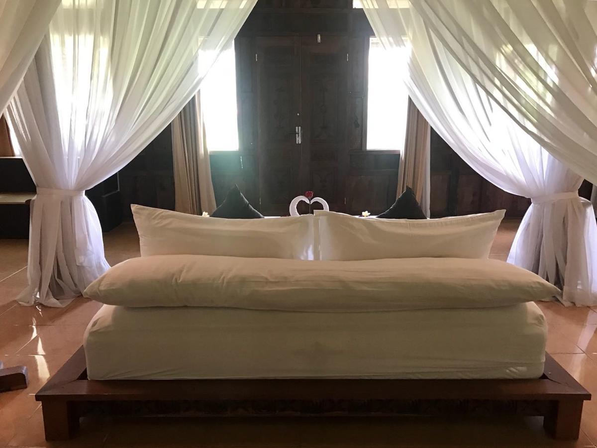 Kampoeng Joglo Abangan Ubud Номер фото